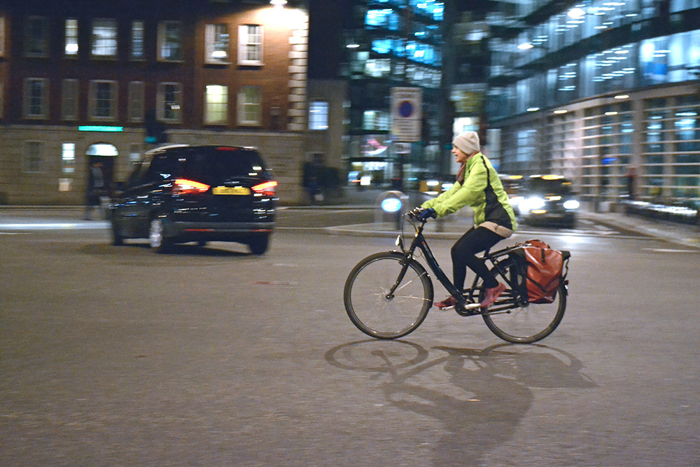 Photo: Barbora Zelenkova A woman cycling on bike in London street. Photo: Barbora Zelenkova, London, 2016.